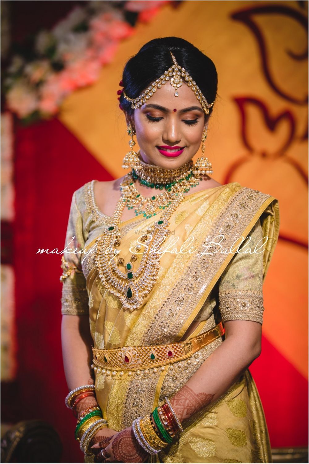 Photo of South Indian bride in yellow and gold saree