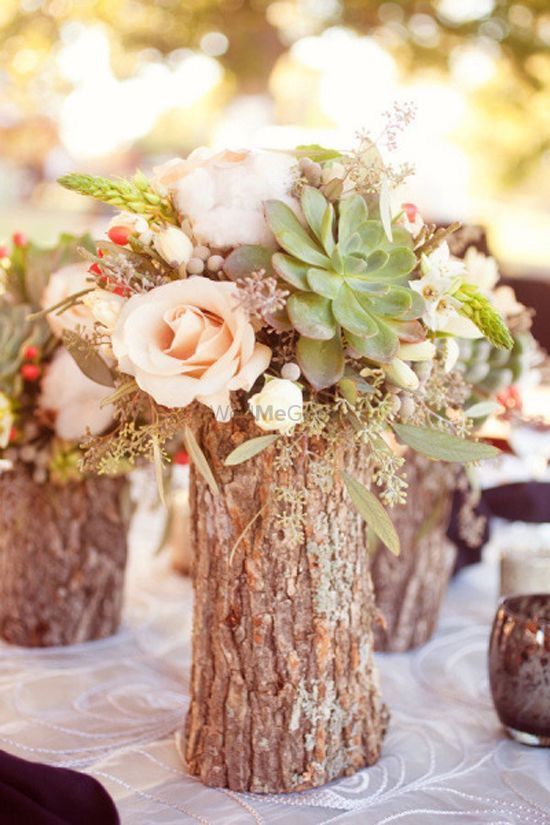 Photo of Wooden Bark Centrepiece with Flowers and Succulents