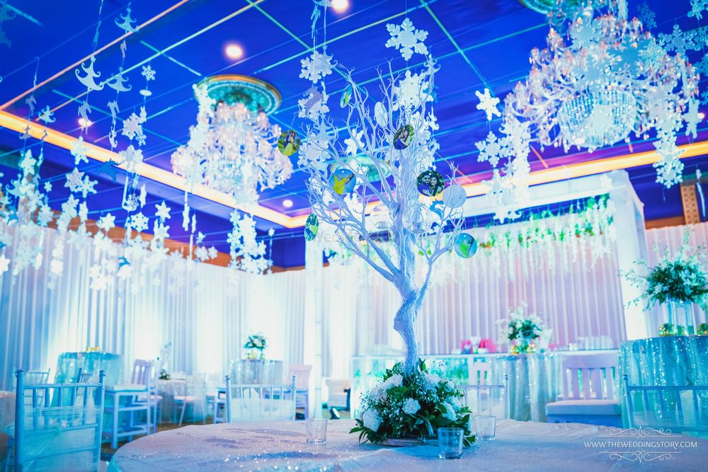 Photo of Beautiful white and blue themed decor