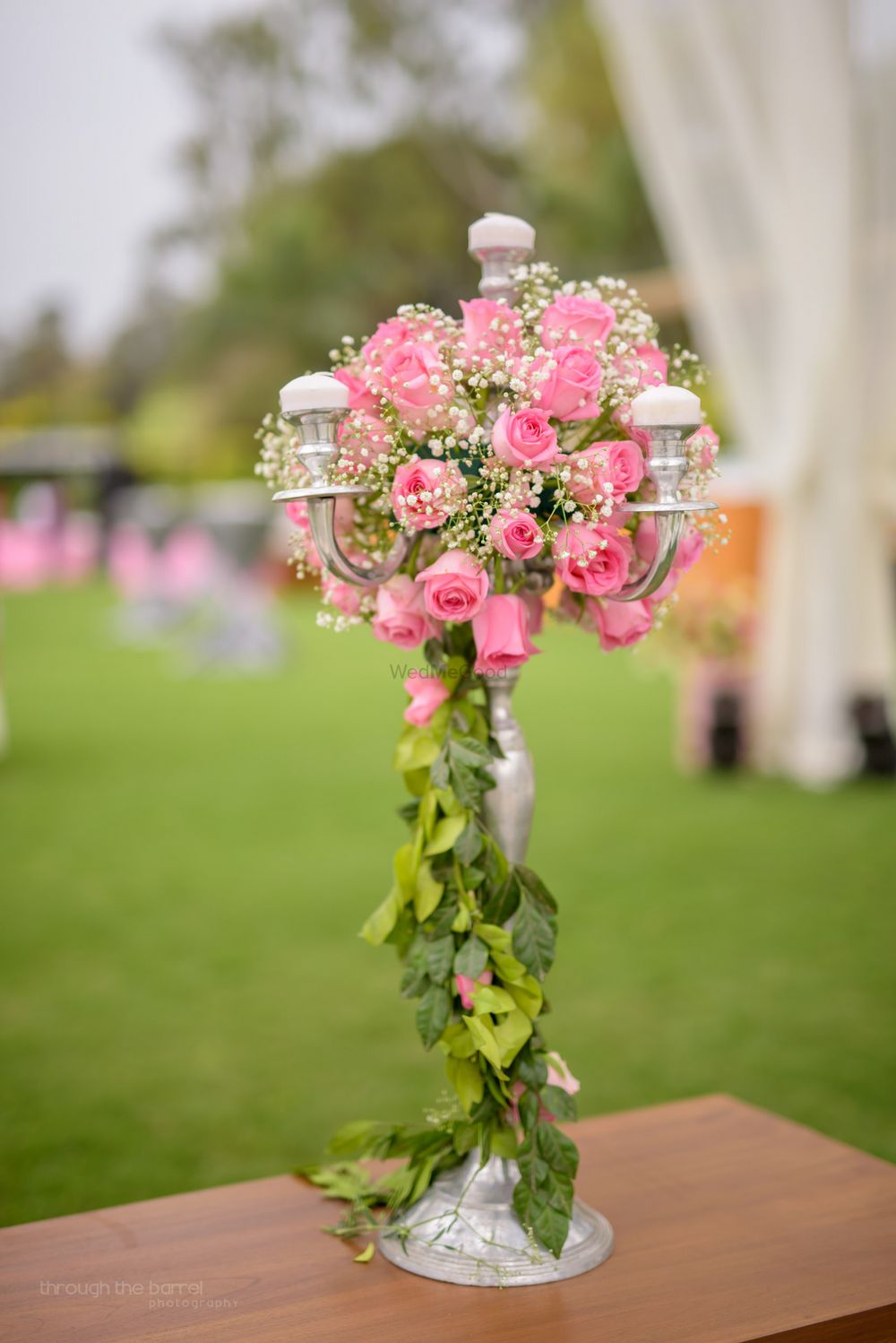 Photo of Silver Candelabras with Pink Floral Decor