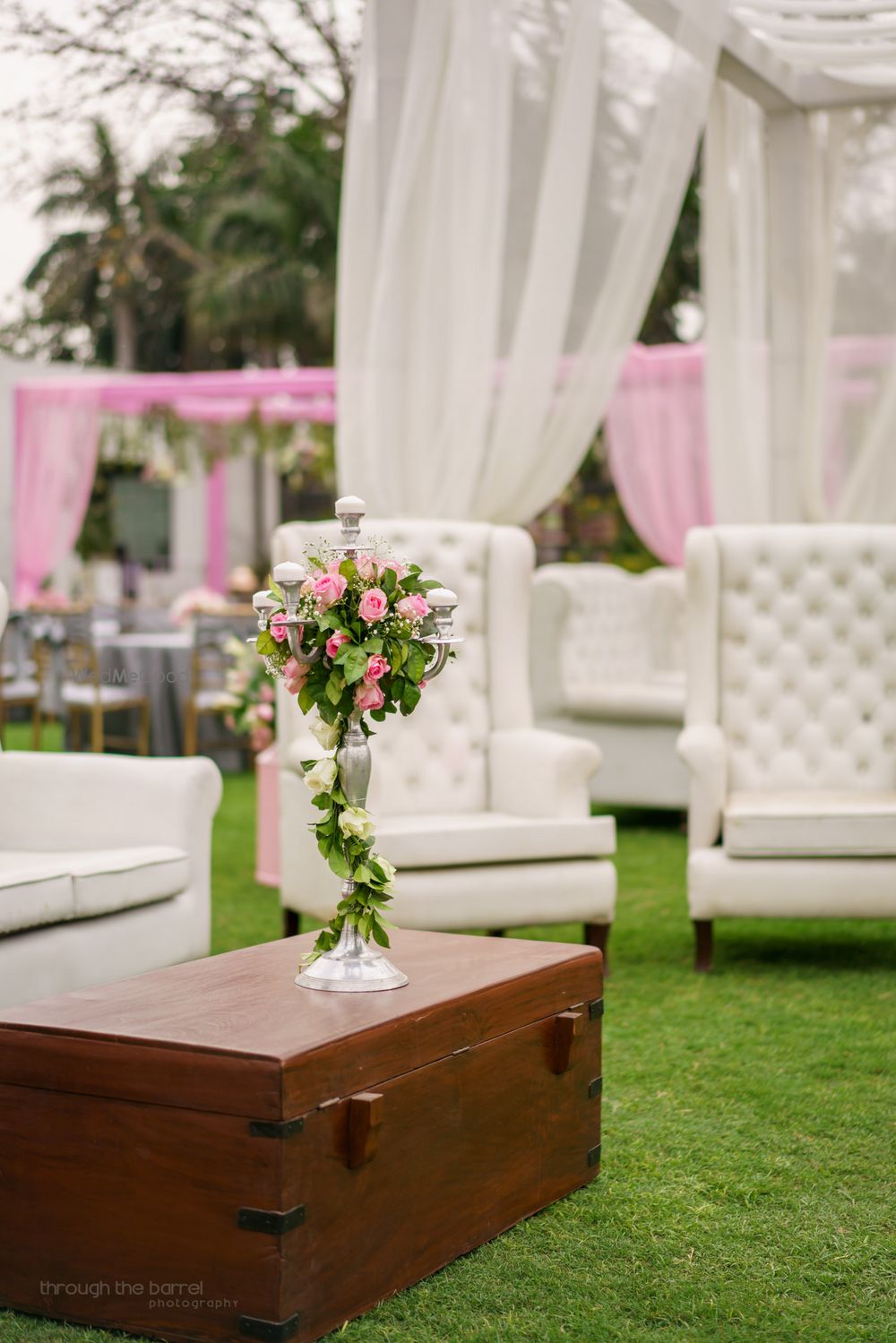 Photo of Pink Floral Centerpiece on Wooden Trunk Decor