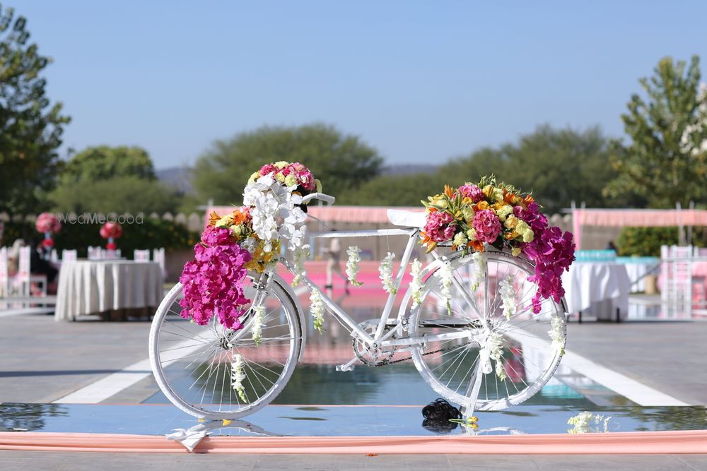 Photo of White floral bicycle photobooth and decor element