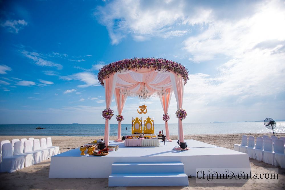 Photo of Pastel floral pink mandap on the beach