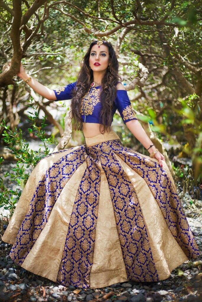 Photo of Blue and gold panelled lehenga for sangeet