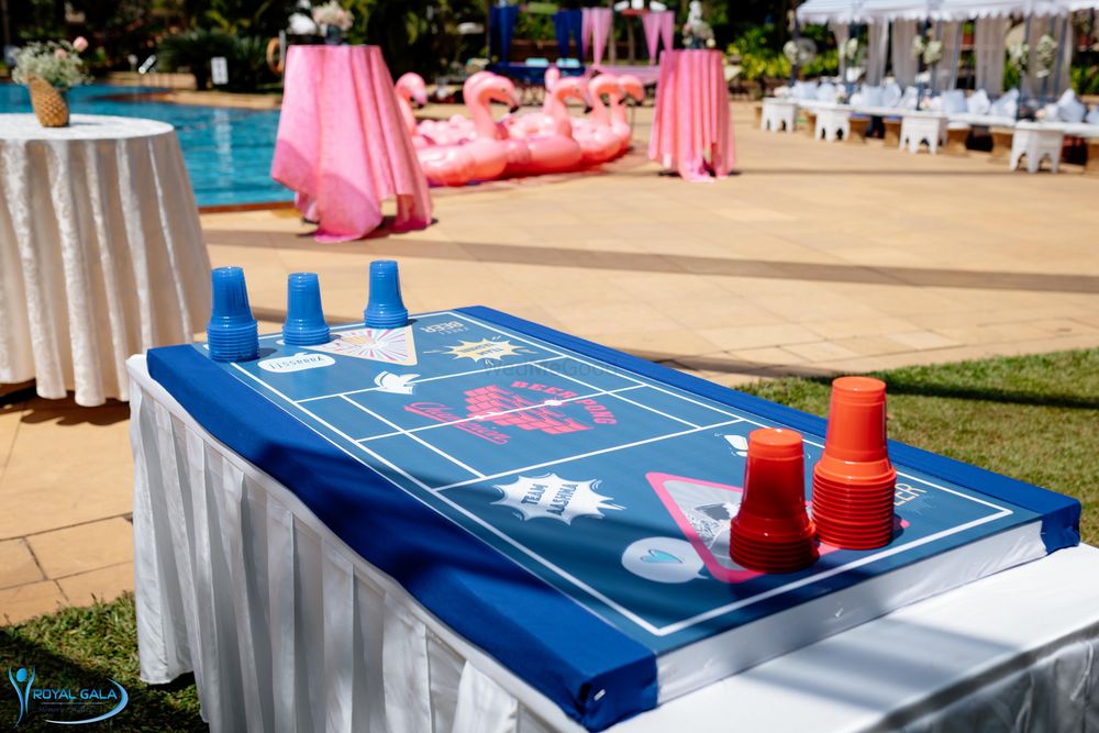 Photo of Beer Pong game at a pool party.