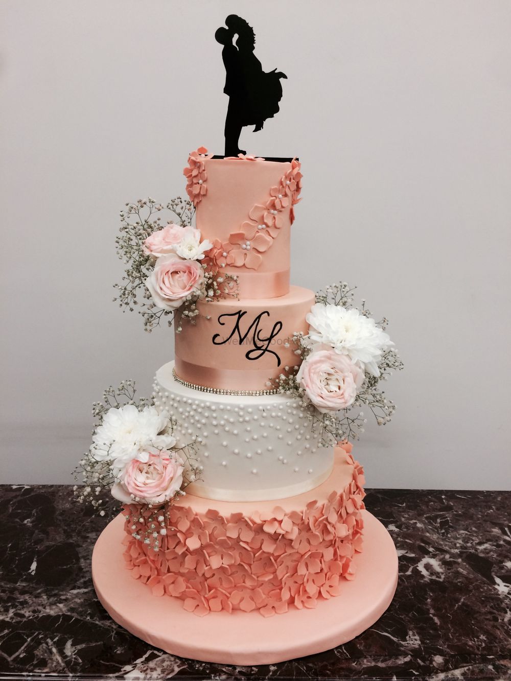 Photo of Light peach pastel cake with romantic cake topper