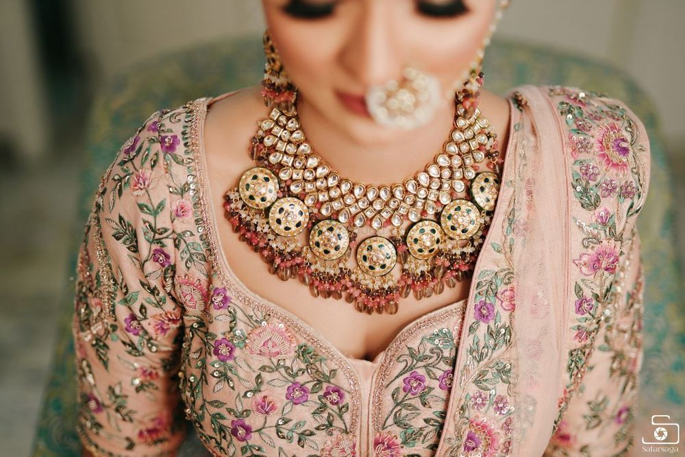Photo of pastel and gold bridal necklace with light pink beads