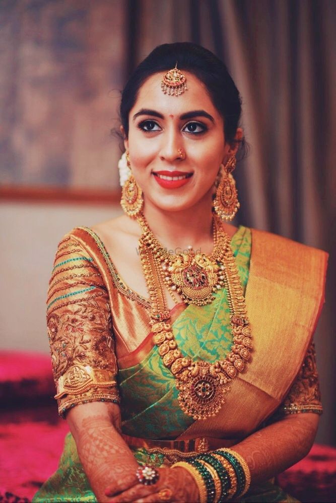 Photo of South Indian bride with unique embroidery blouse