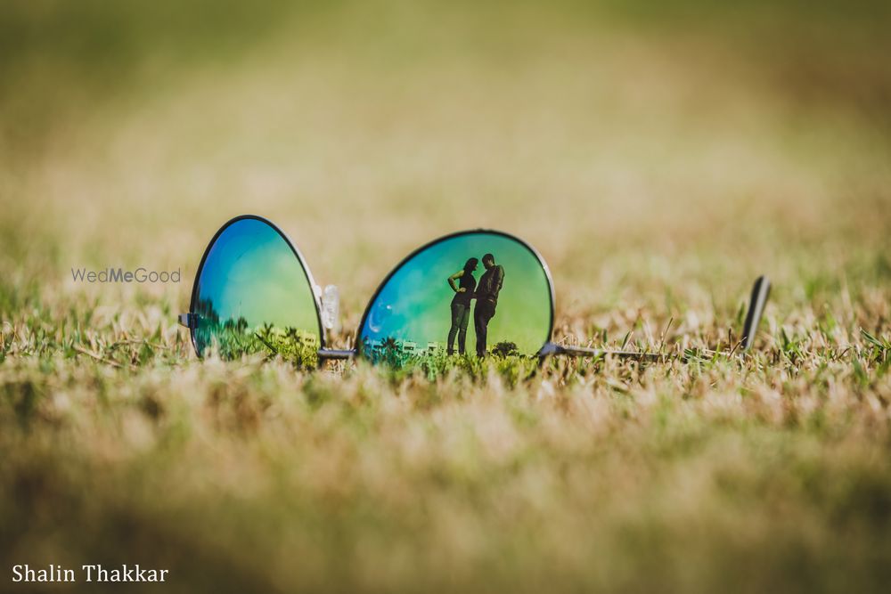 Photo of Honeymoon sunglasses reflection shot