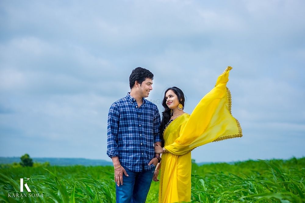 Photo of Simple outdoor field pre wedding shoot