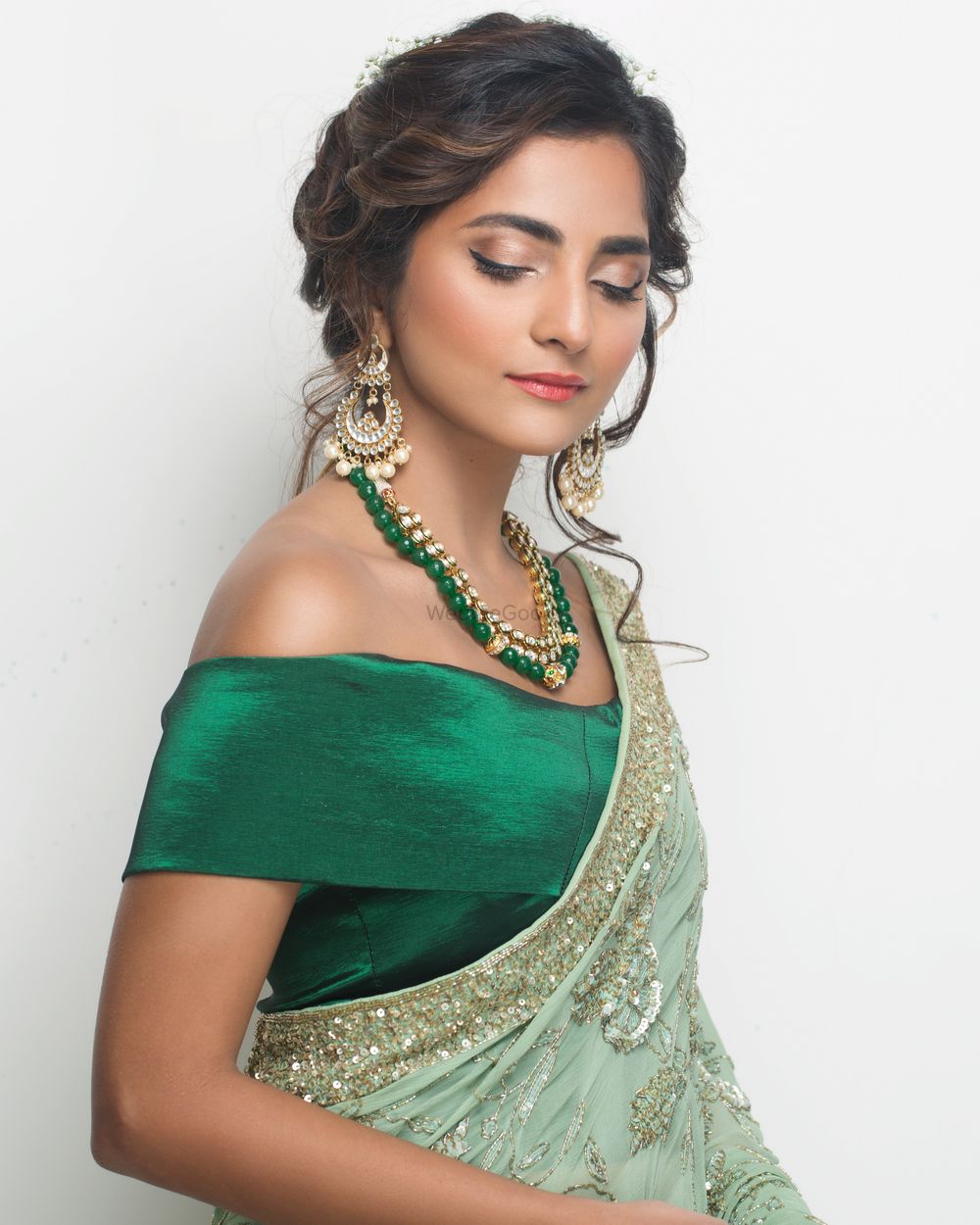 Photo of Sangeet or reception outfit with off shoulder blouse