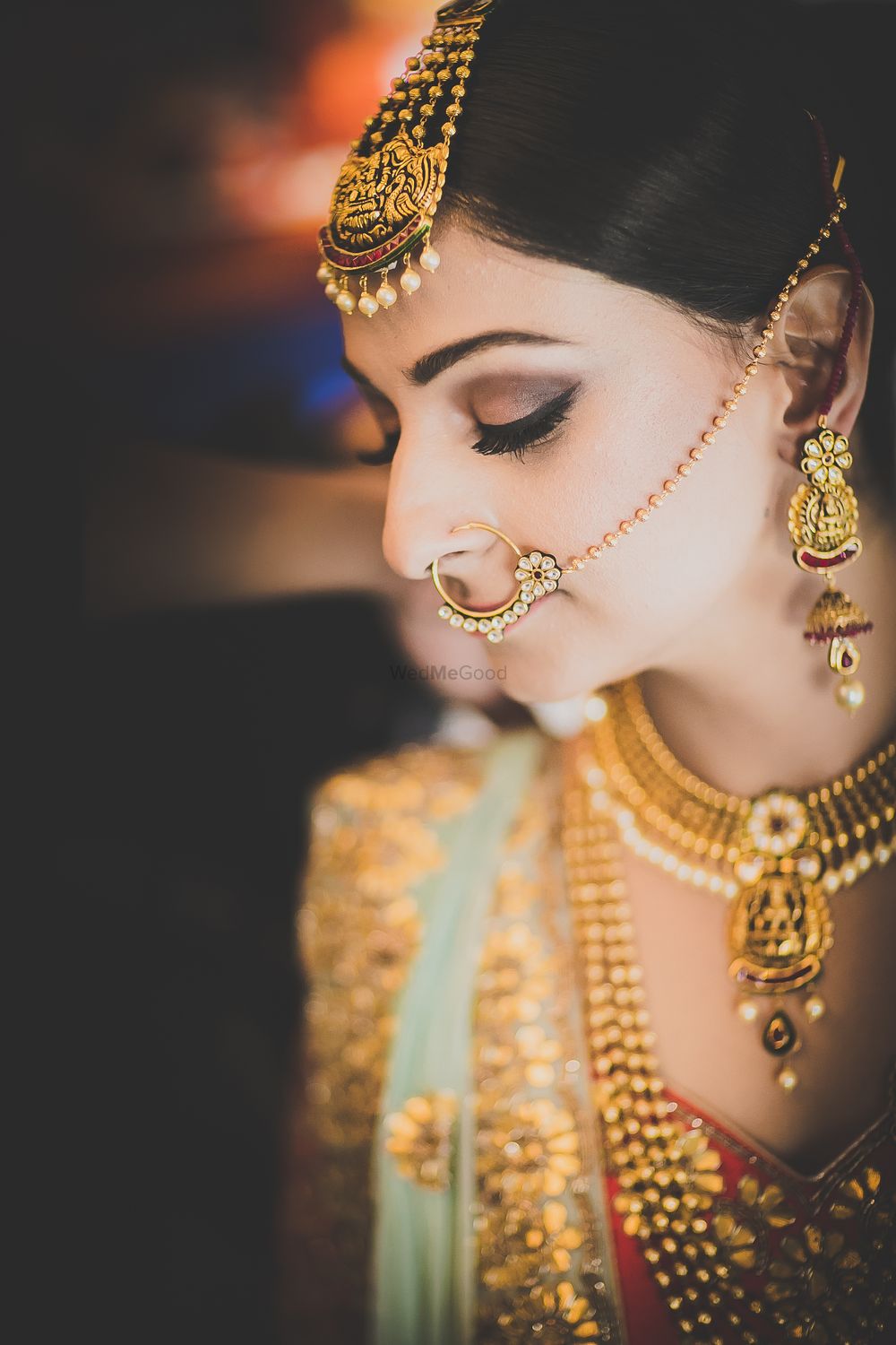 Photo of Temple bridal jewellery with nath and maangtikka