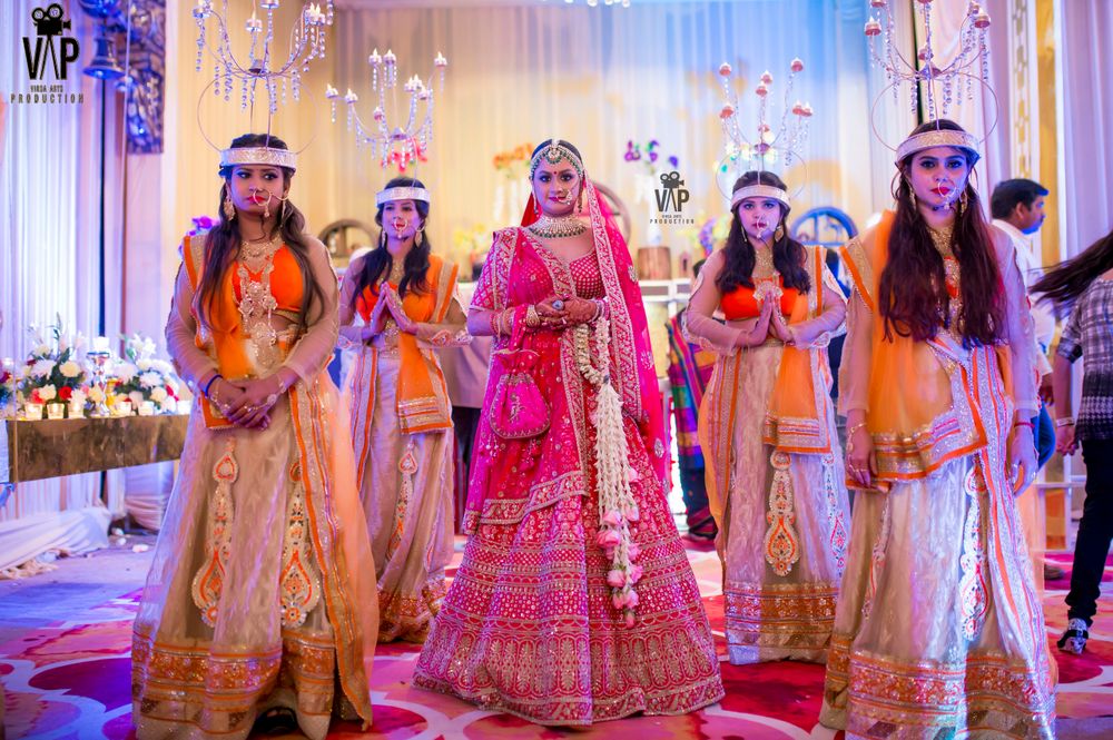 Photo of Stunning hanging floral kaleere with bright pink lehenga  for wedding