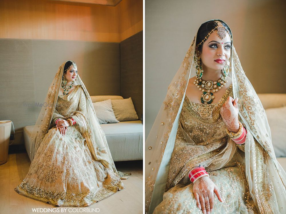 Photo of goldlehenga with atouch of green