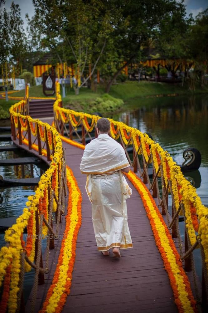 Photo of yellow and orange genda flower entrance decor