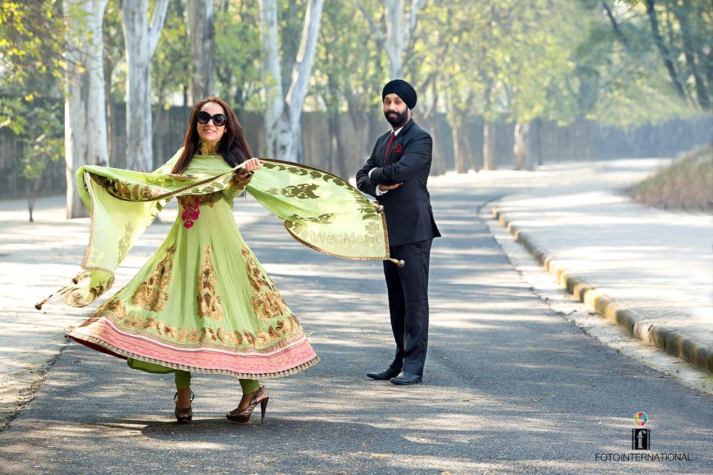 Photo of mint green and gold anarkali