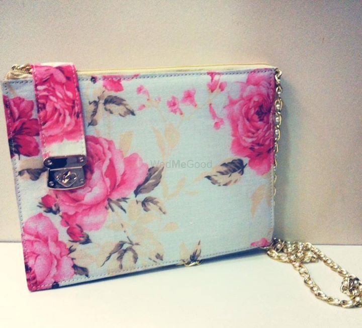 Photo of floral printed clutch bag