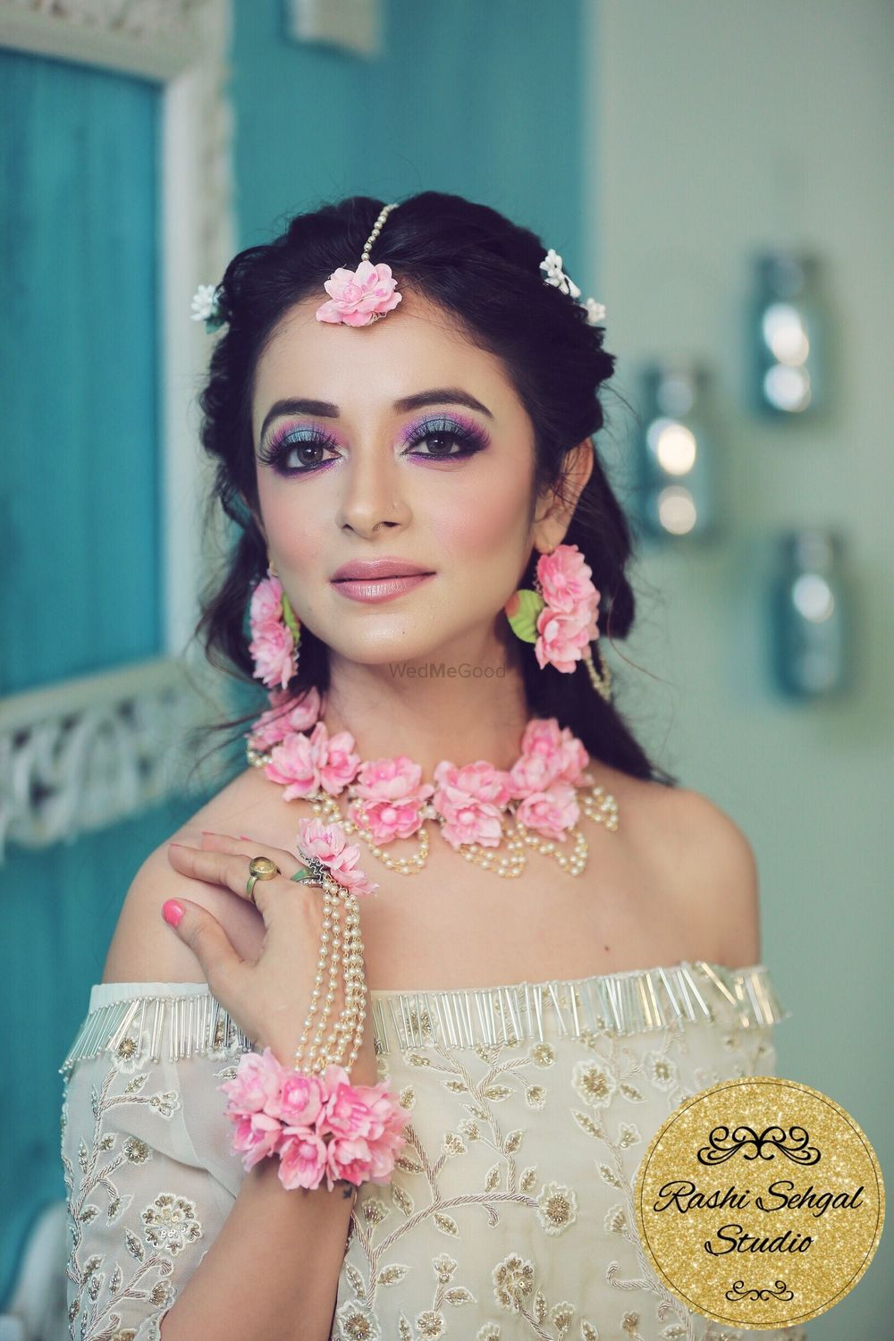 Photo of Pink floral jewellery with white outfit