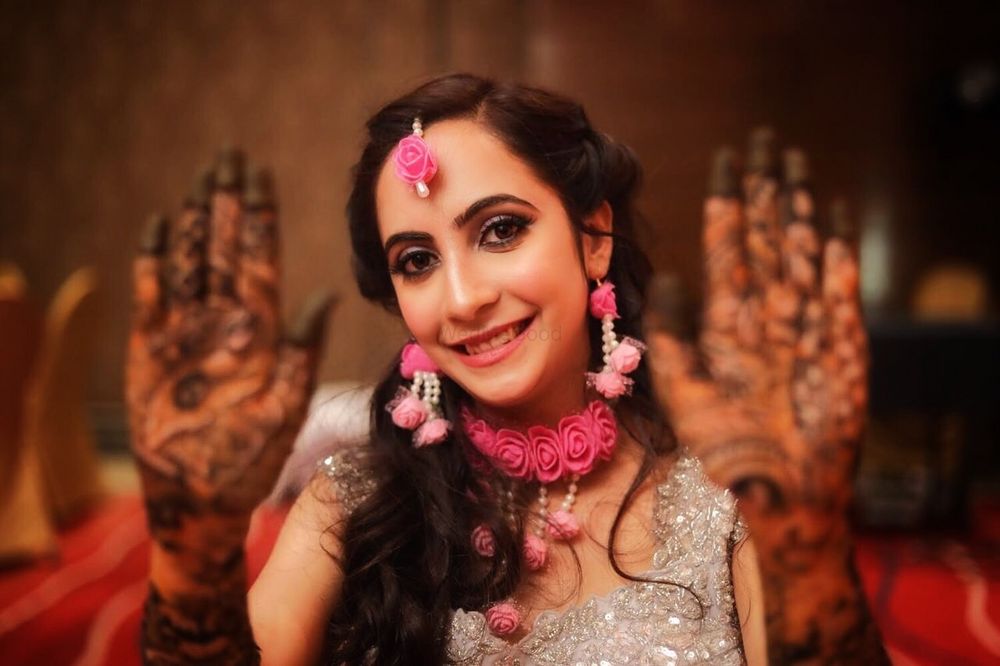 Photo of Flawless and subtle bridal makeup for mehndi ceremony