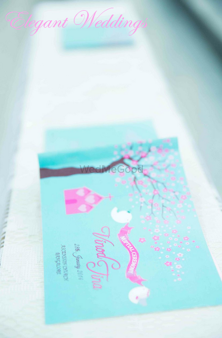 Photo of turquoise and pink wedding cards