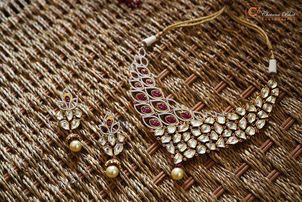 Photo of Peacock Inspired Polki and Ruby Jewelry with Pearl Drop