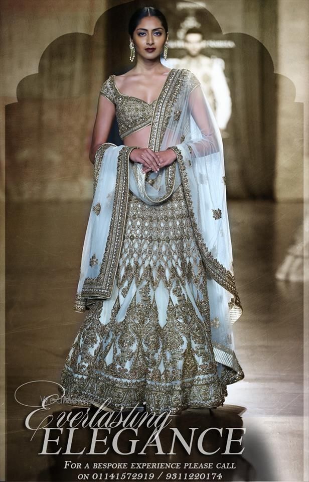 Photo of gold and white lehenga