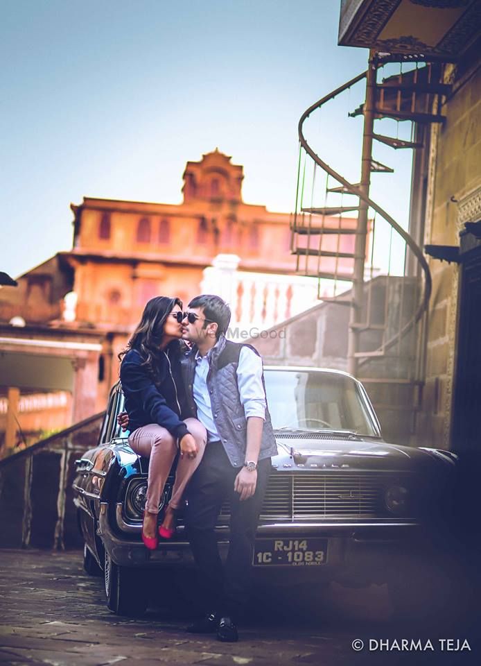 Photo of couple on a car
