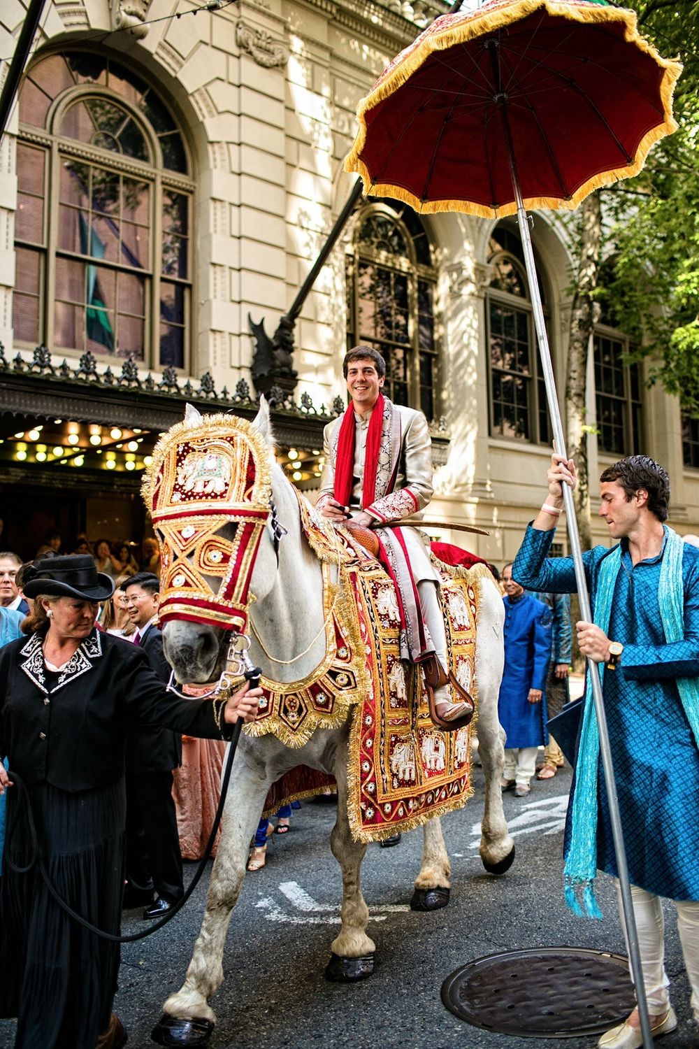 Photo of A groom entering on a horse