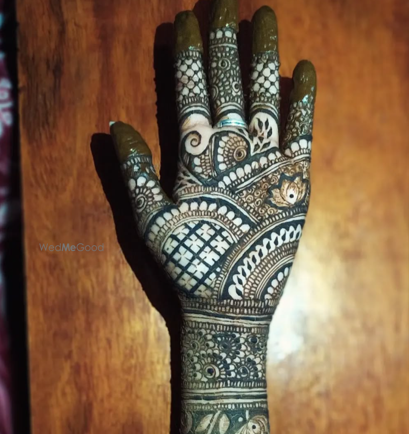 Henna Stains by Priyanka