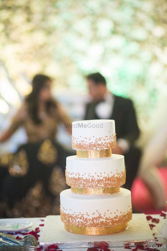 Photo of 3 tier rose gold engagement wedding cake