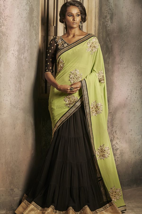 Photo of black and green saree