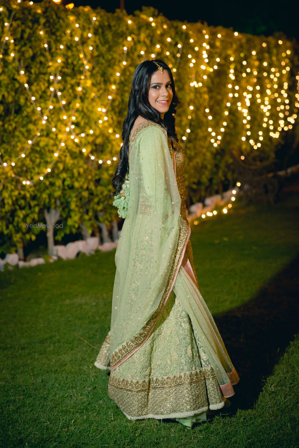 Photo of Pastel Green Tissue Lehenga with Gold Border