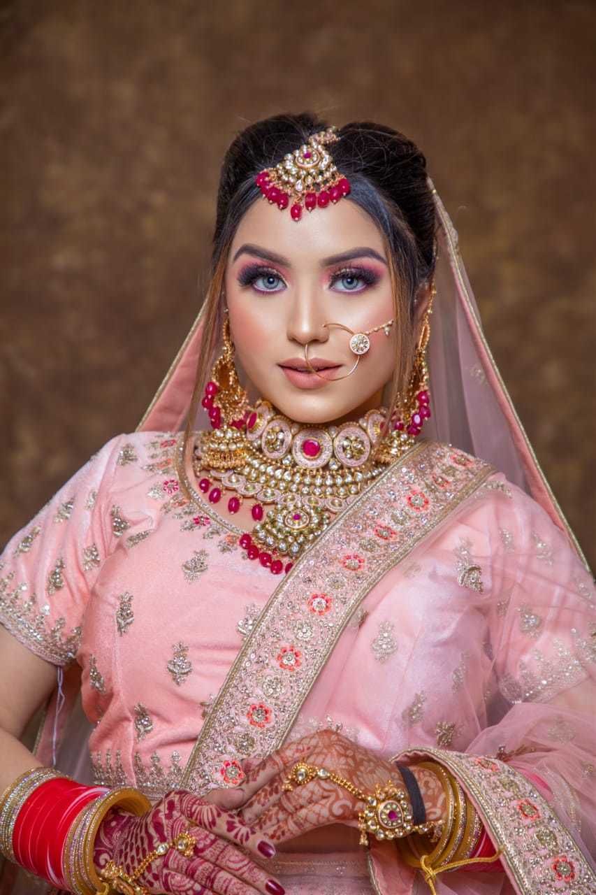 Photo By hudda beauty - Bridal Makeup