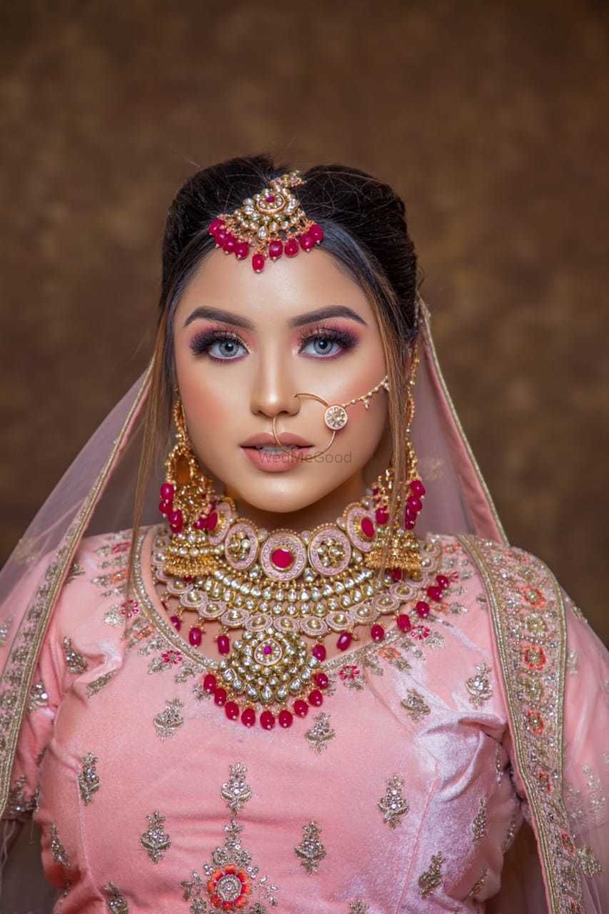 Photo By hudda beauty - Bridal Makeup