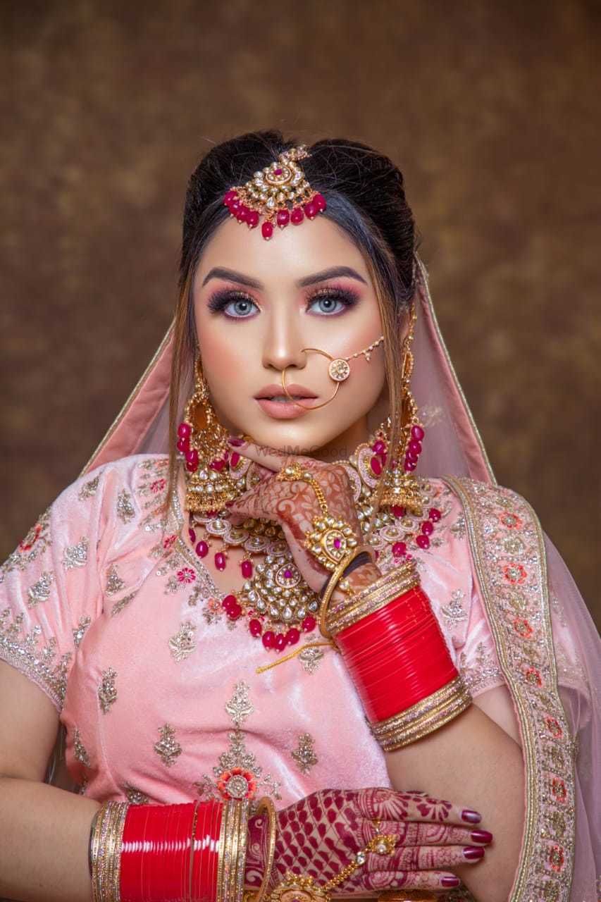 Photo By hudda beauty - Bridal Makeup