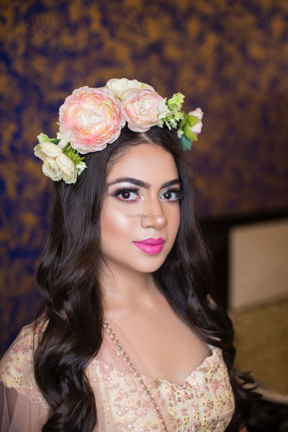 Photo of Oversized floral crown with open hairstyle