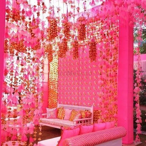 Photo of Bright pink mehendi decor idea with suspended decor