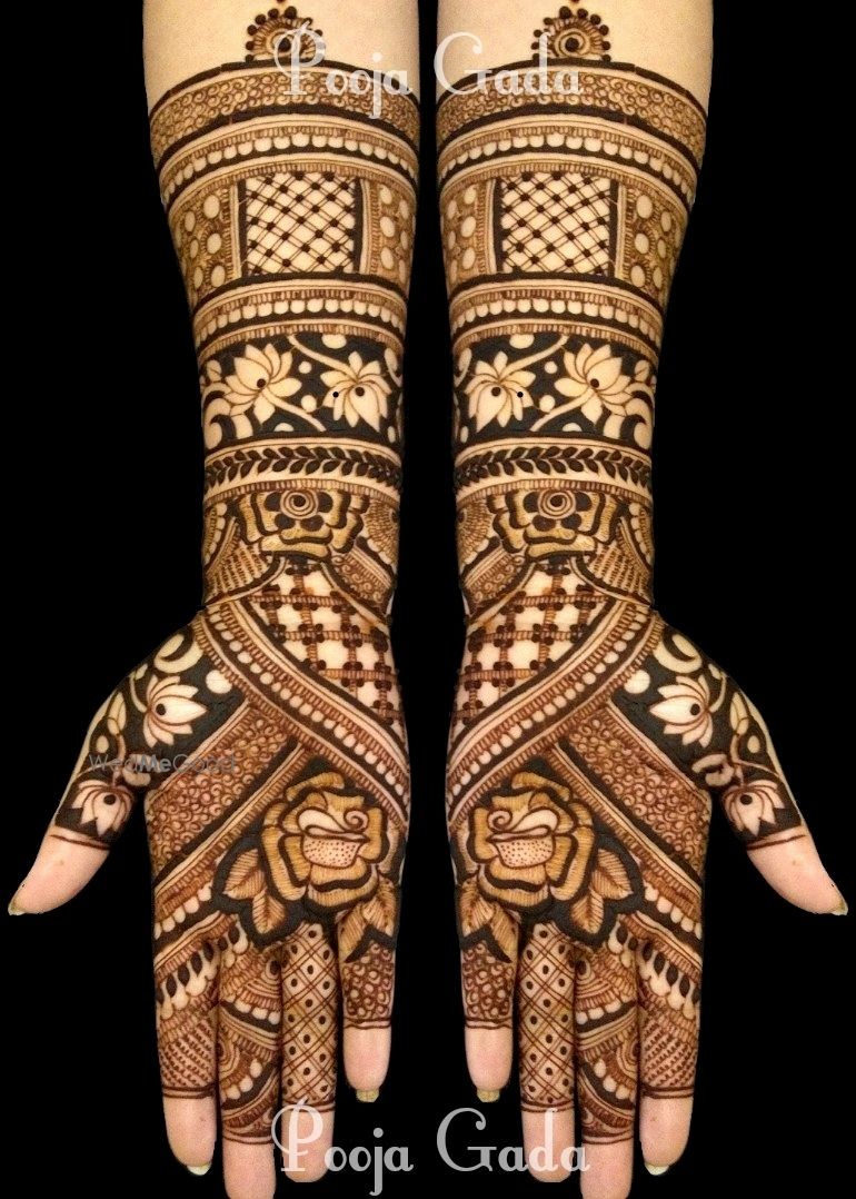 Photo of Stunning bridal mehendi with lotus motif designs