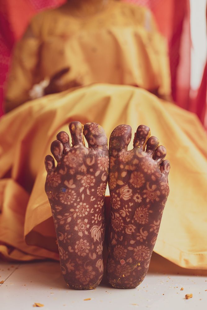 Photo of unique feet mehendi shot on the sole