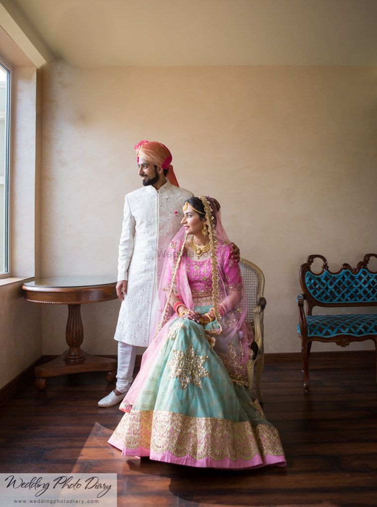 Photo of Bride in Pale Blue and Light Pink Bridal Lehenga