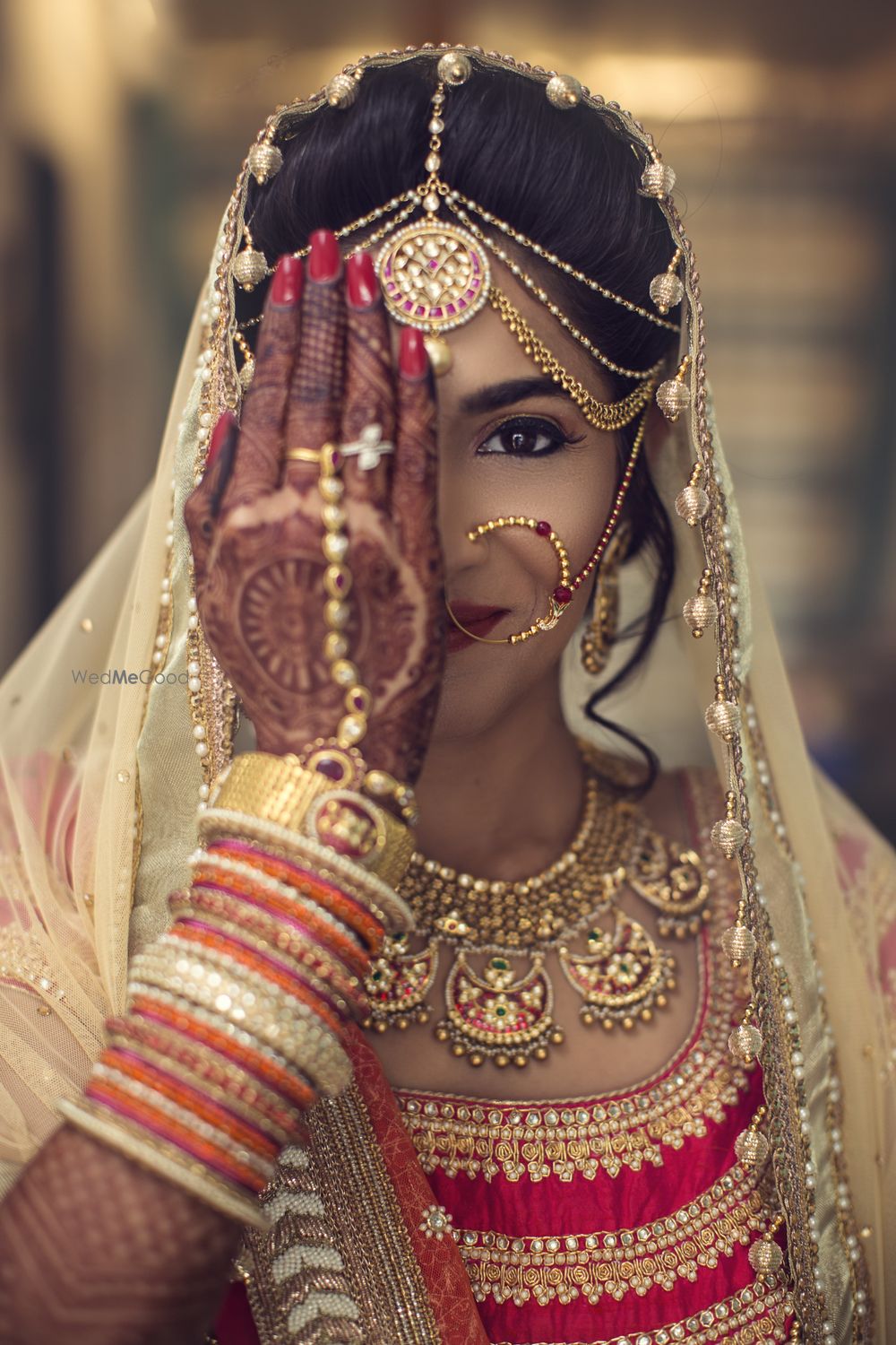 Photo of red and gold lehenga