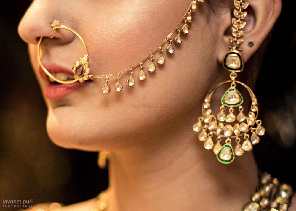Photo of Bridal earrings and Nath with Kundan work