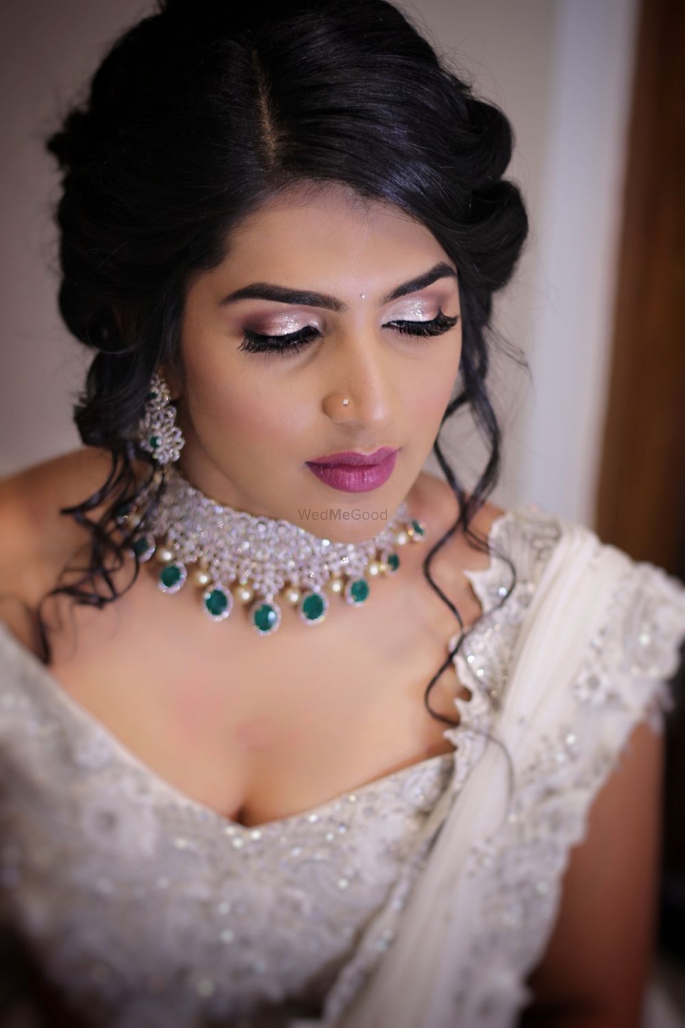 Photo of Pretty bridal engagement look with emerald jewellery
