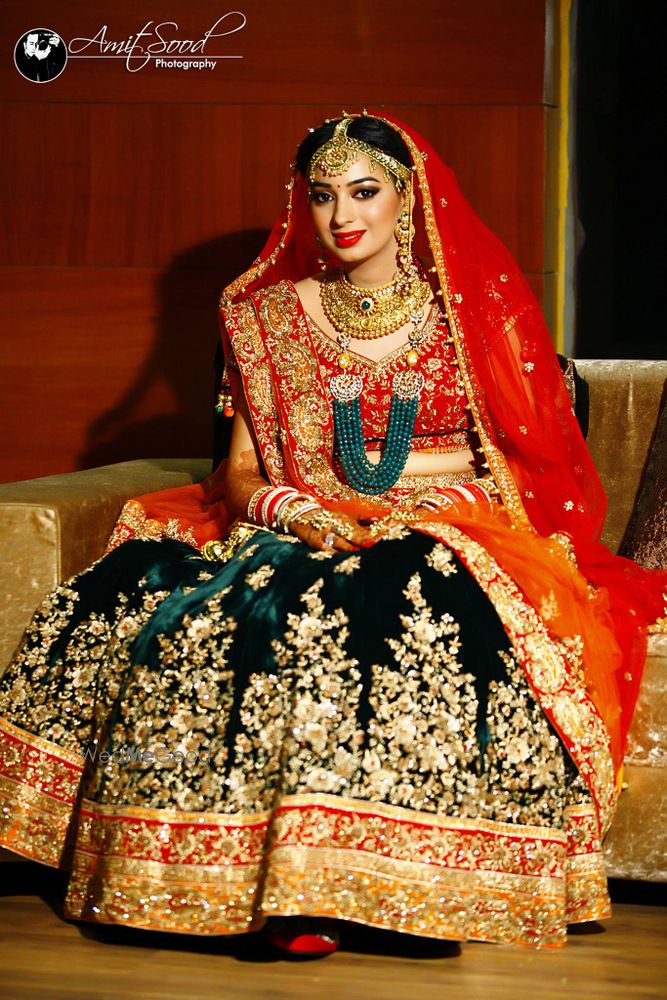 Photo of red and green lehenga