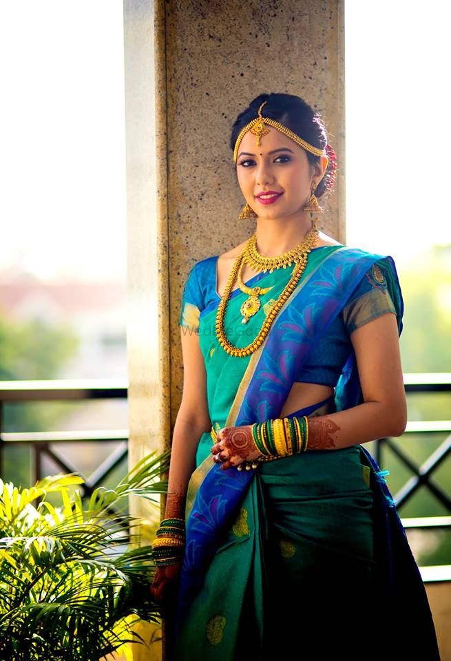 Photo of South indian bride in green and blue saree