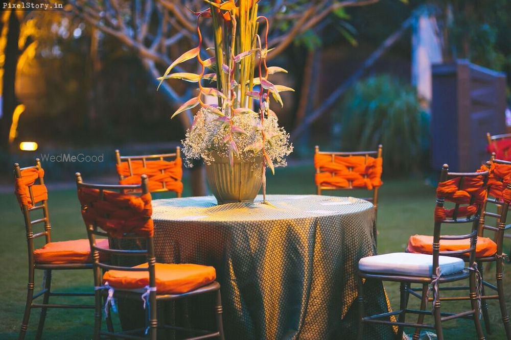 Photo of Chairs with orange tiebacks