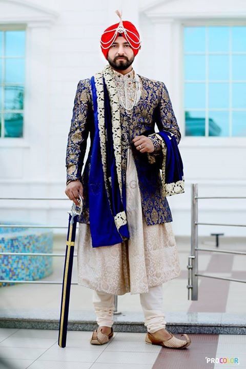 Photo of Sikh Groom in Royal Blue Jacket and White Sherwani