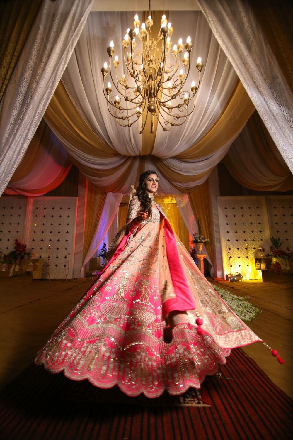 Photo of Double shaded coral and bright pink gold embellished anarkali for Reception