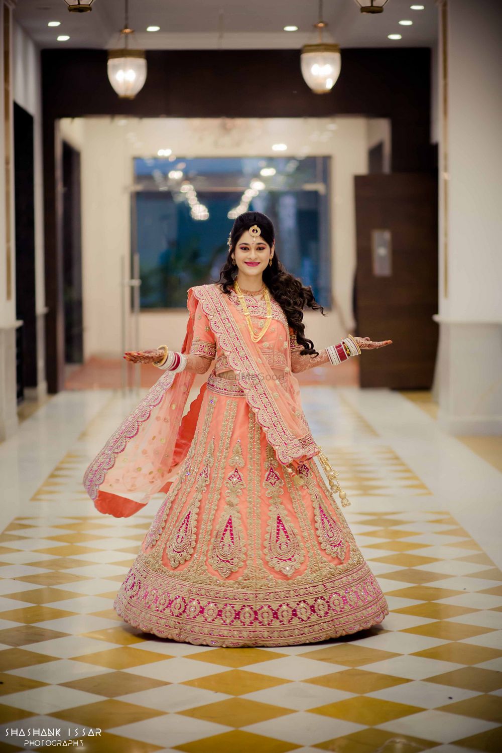 Photo of Peach and Pink Lehenga with Thread and Stone Work