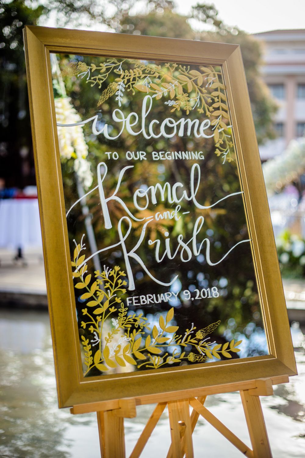 Photo of Welcome board on mirror for entrance decor